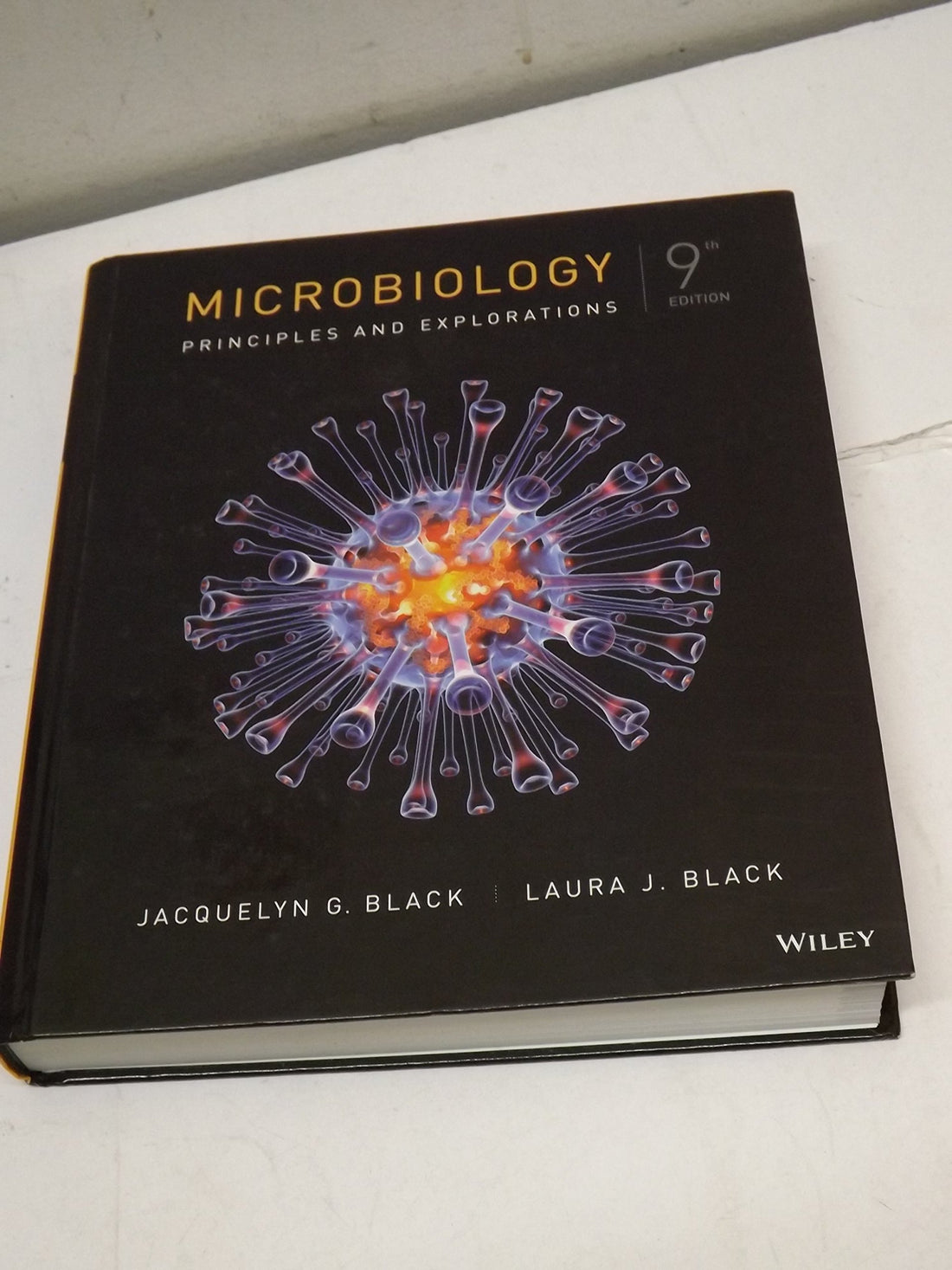 Microbiology: Principles and Explorations — used book cover